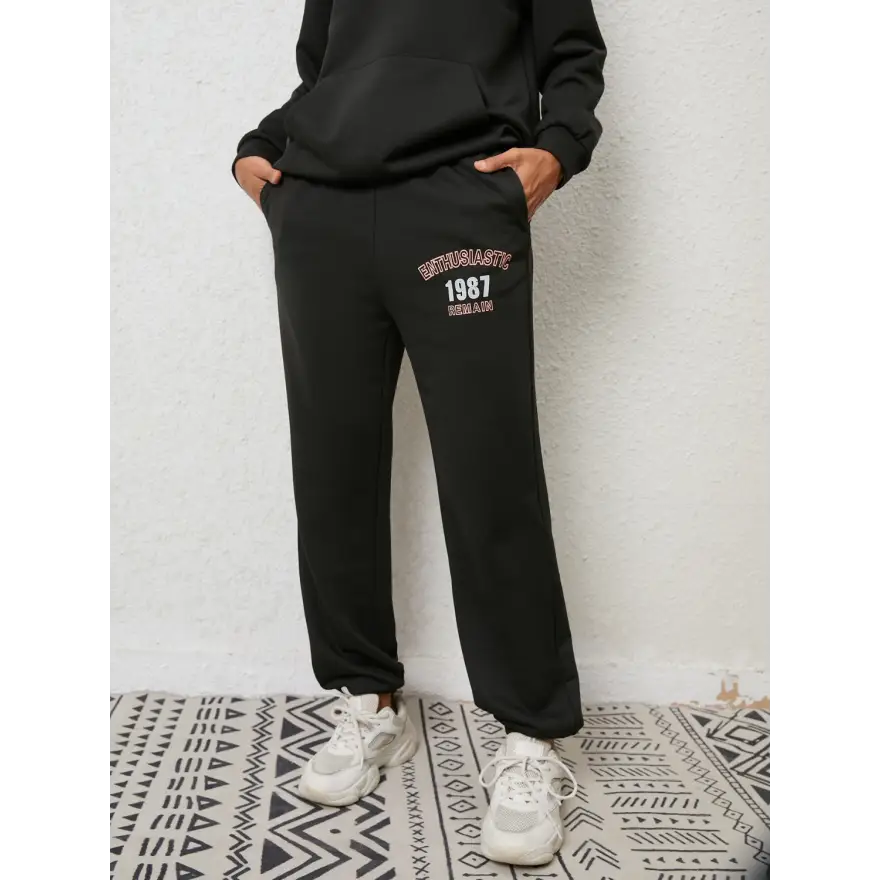 Cozy Graphic Hoodie and Sweatpants Set with Adjustable Sleeve Length Clothing Tops Trendsi