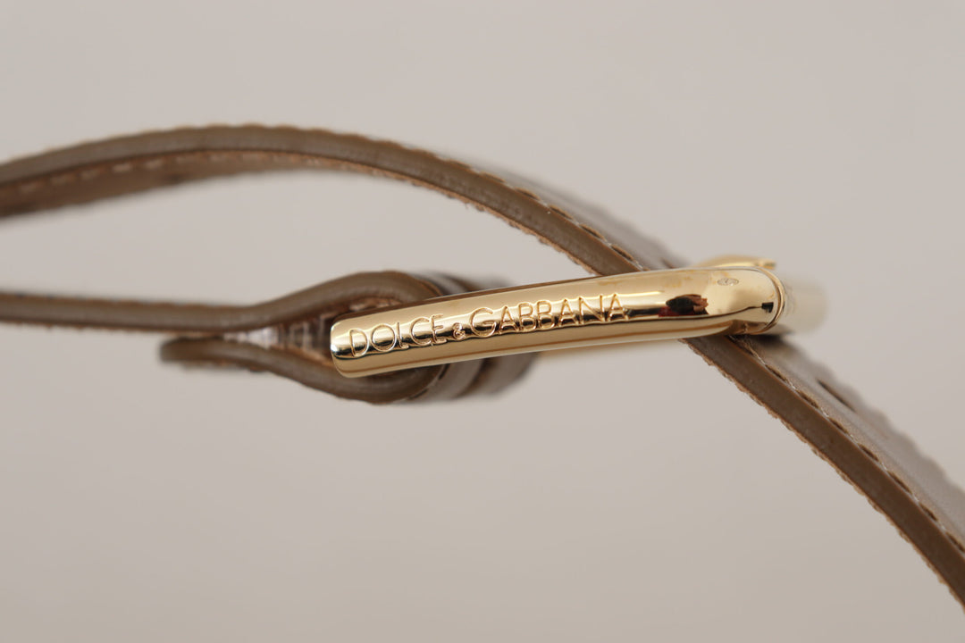 Perfume Ignite Your Dress con cinturón de bronce de Dolce Gabbana