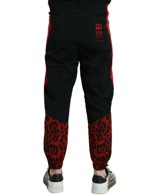 Pantalones deportivos de nailon con estampado de leopardo en negro y rojo de Dolce & Gabbana