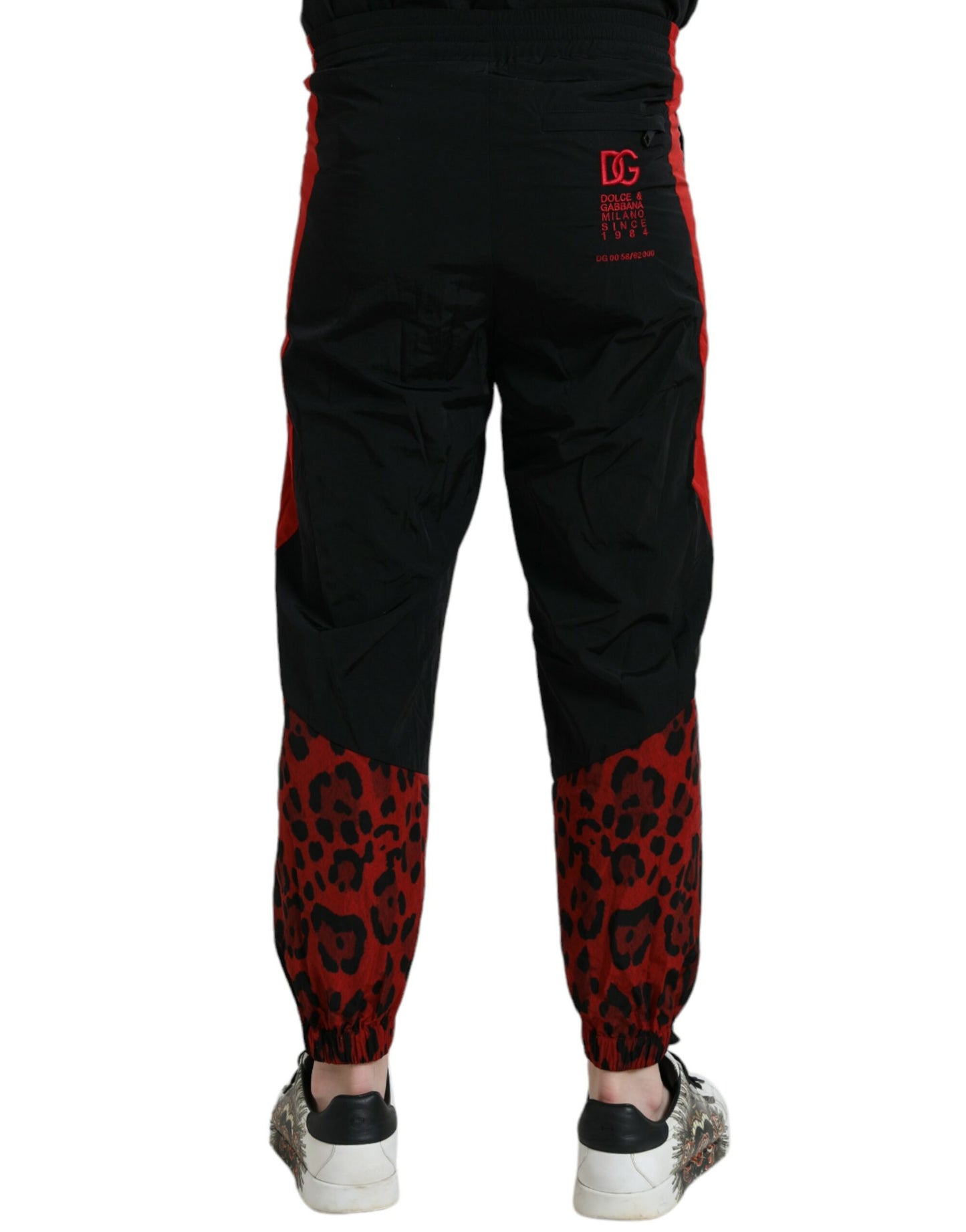 Pantalones deportivos de nailon con estampado de leopardo en negro y rojo de Dolce &amp; Gabbana