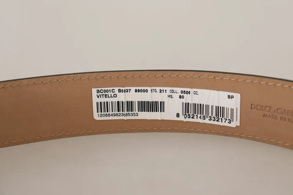 Cinturón de cuero negro con hebilla grabada con el logotipo de metal dorado de Dolce &amp; Gabbana