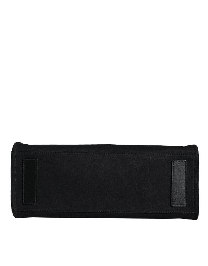 Bolso tote cruzado Versace de lona y cuero con asa superior en color negro y logotipo