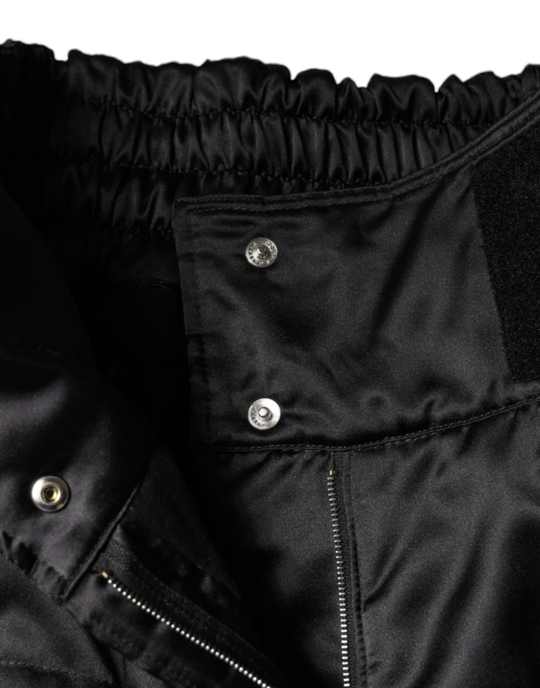 Pantalones negros de corte bota con cintura alta y acolchados de Dolce &amp;amp; Gabbana para mujer