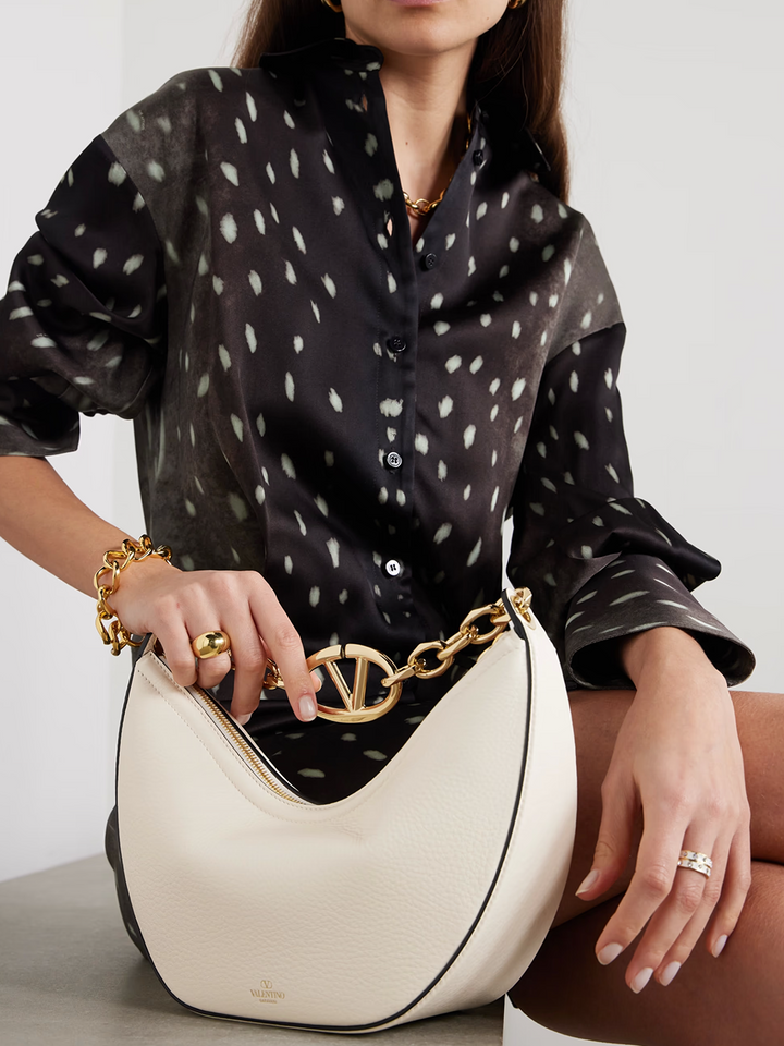 Valentino Garavani Petit sac à bandoulière Hobo Vlogo en cuir ivoire