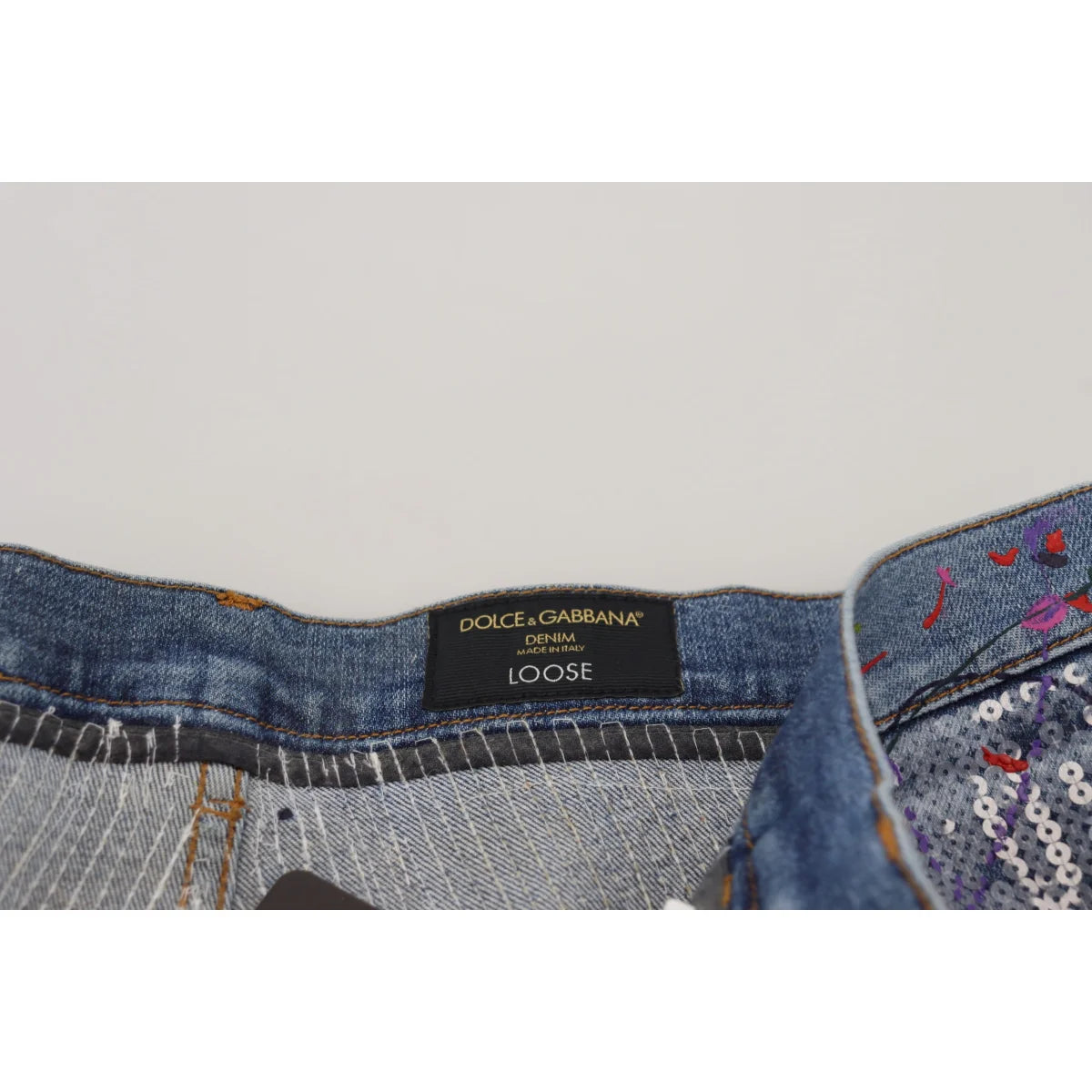 Bold Dolce Gabbana Blue Jeans with Color Splash Print and Zipper Closure &