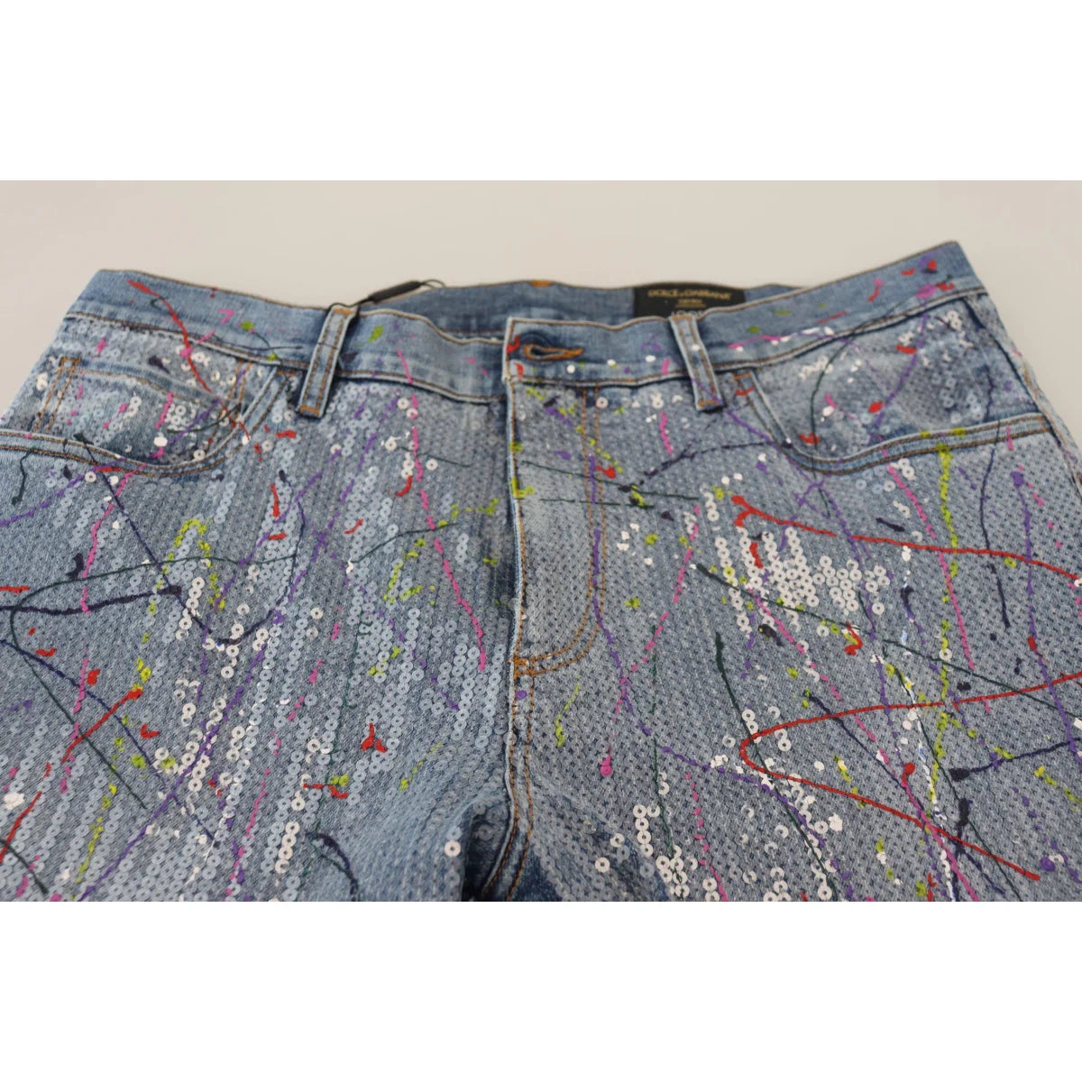 Bold Dolce Gabbana Blue Jeans with Color Splash Print and Zipper Closure &