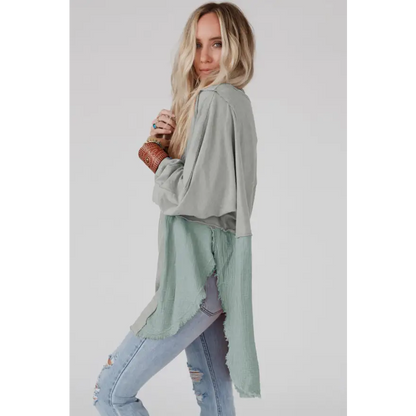 Elevate Your Style with the Curved Hem Dolman Sleeve Top Clothing Tops Trendsi