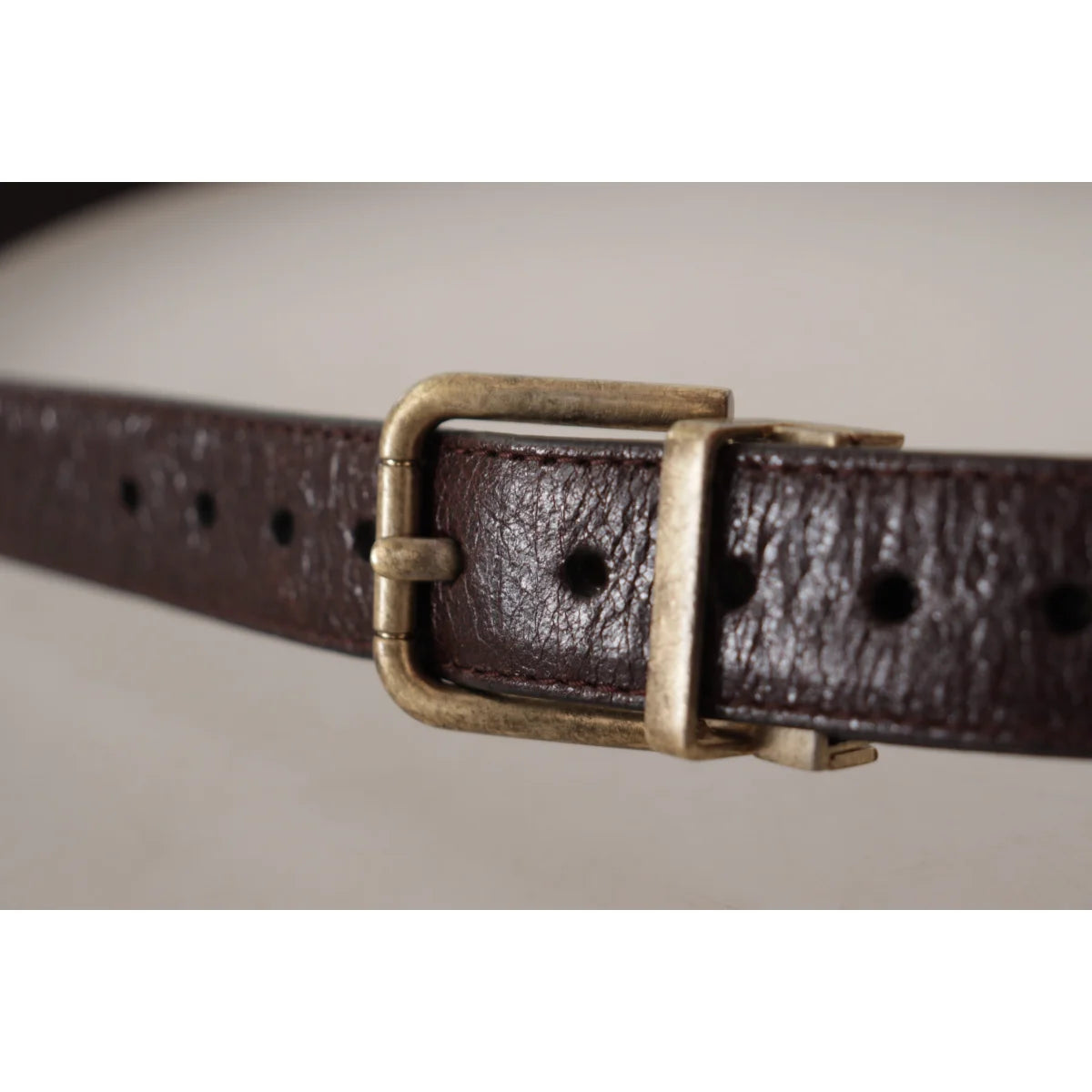 Dolce & Gabbana Elegant Leather Belt with Eye Catching Engraved Buckle