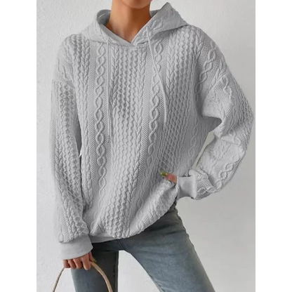 Elevate Your Style with the Textured Drawstring Long Sleeve Hoodie Clothing Tops Trendsi