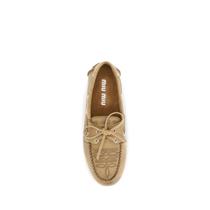 Miu Beige Calf Leather Bos Taurus Slip-on Loafers