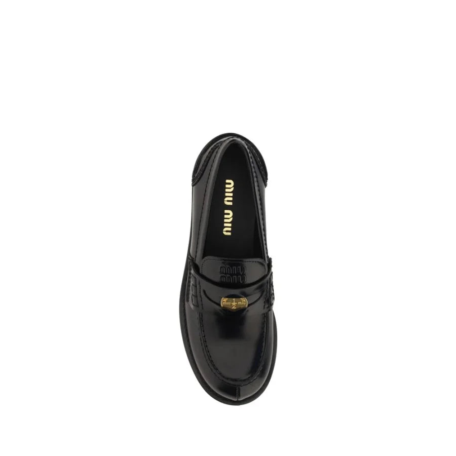 Miu Black Calf Leather Bos Taurus Slip-On Loafers