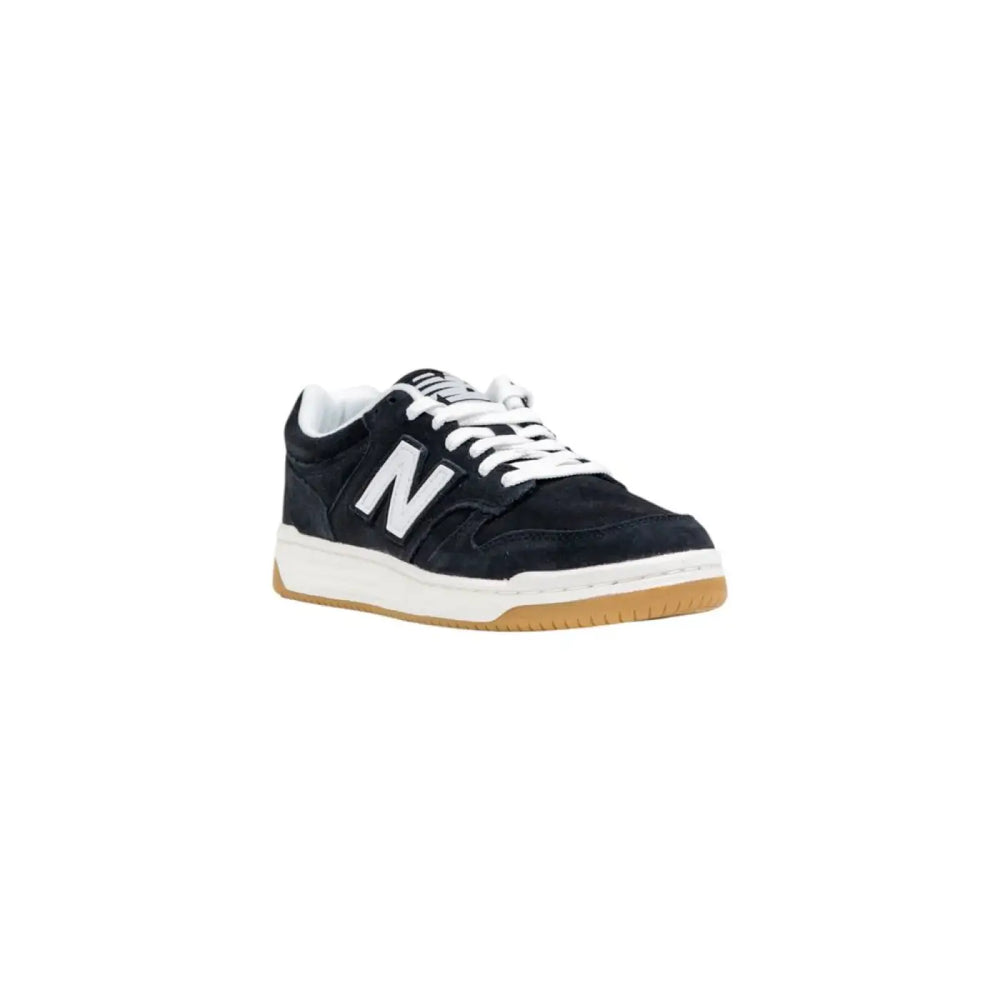 Women’s New Balance Black and White Leather Athletic Sneakers
