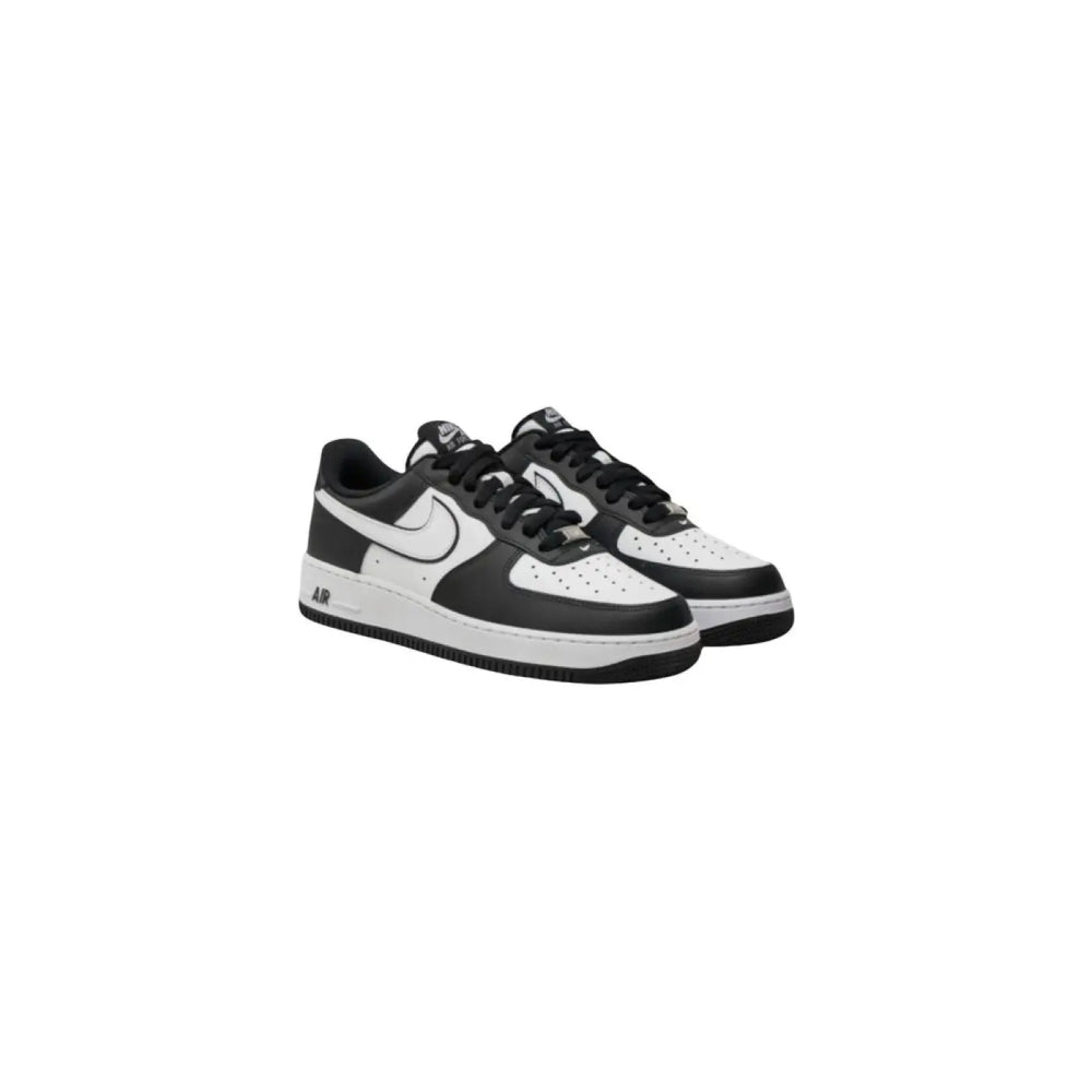Nike Black and White Leather Low Top Sneakers