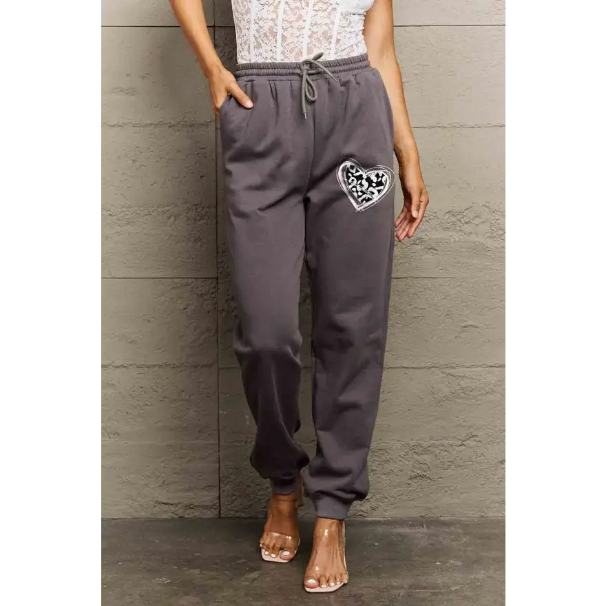 Feel the Love in Drawstring Heart Graphic Long Sweatpants Trendsi