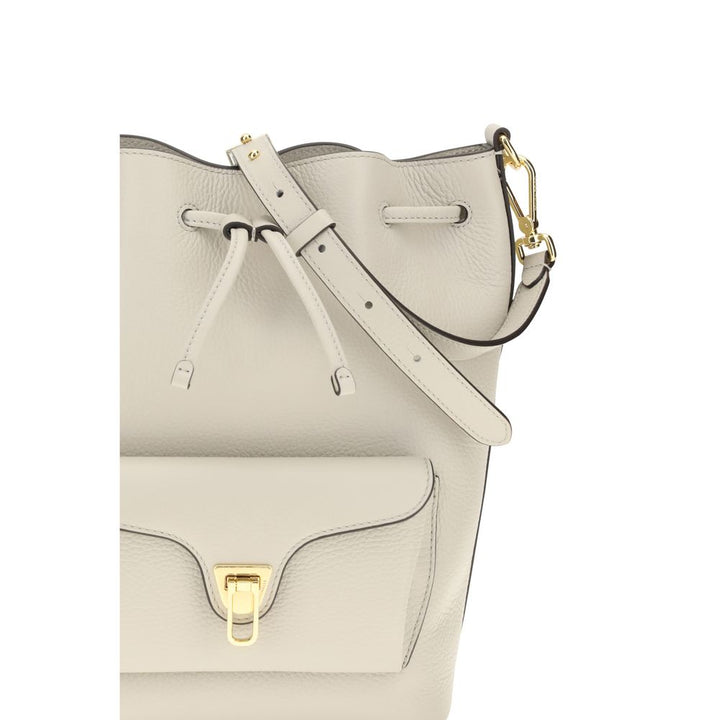 Women’s Coccinelle Beige Calf Leather Bos Taurus Backet Bag