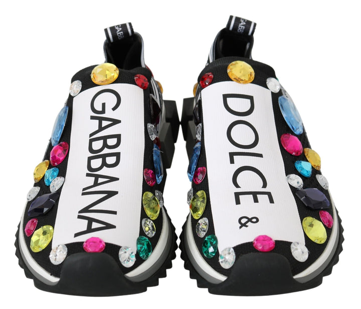 Zapatillas deportivas Dolce Gabbana con suela de goma y logo. Vestido llamativo.
