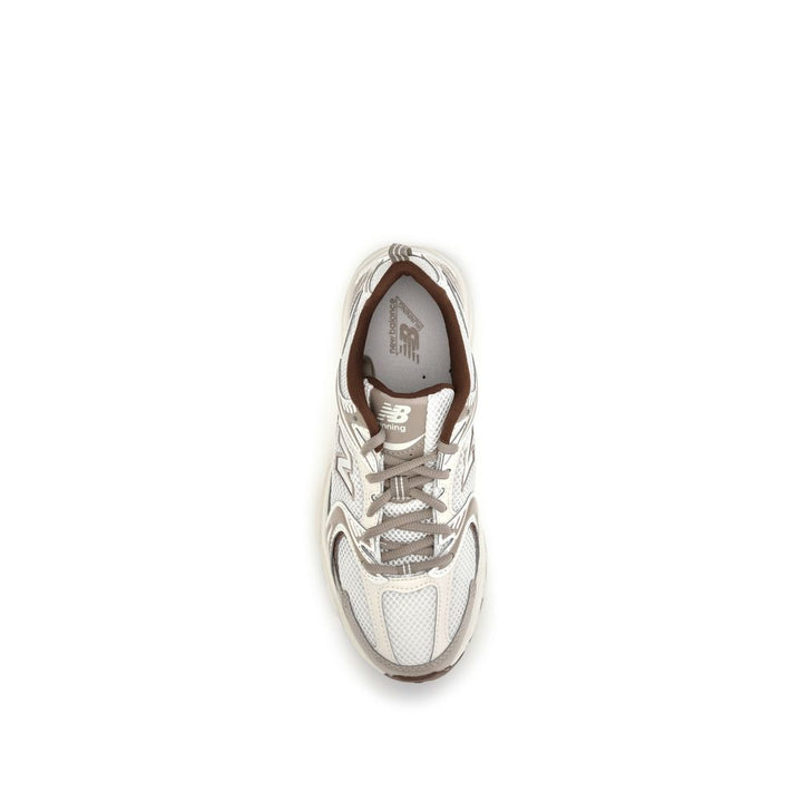 Women’s New Balance Silver Nylon Athletic Sneakers